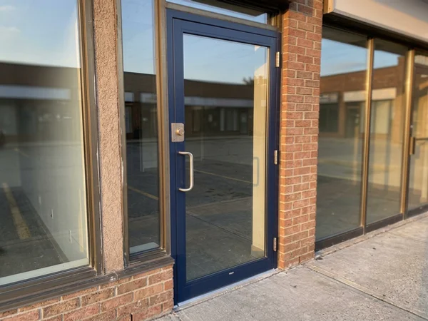 After: repaired door with laminated glass and new deadlock